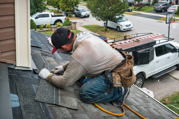 Professional Roofing technician working in Vassar, KS
